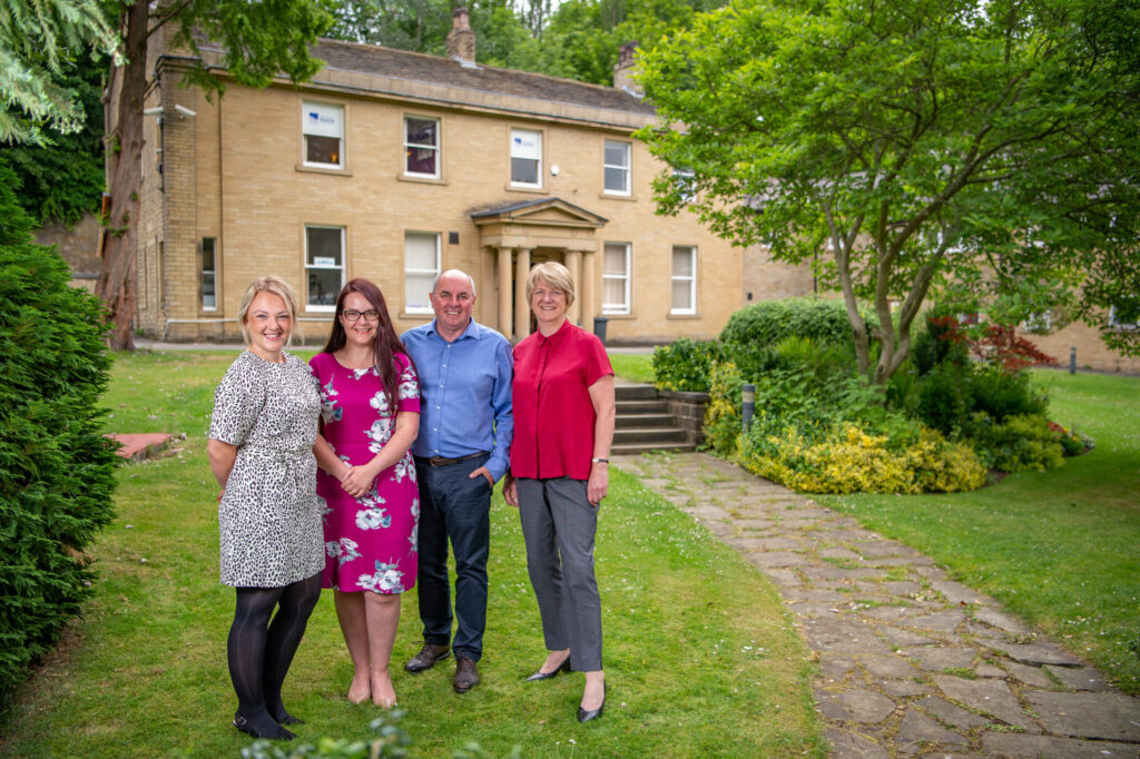 The Pennine HR team outside their Huddersfield office